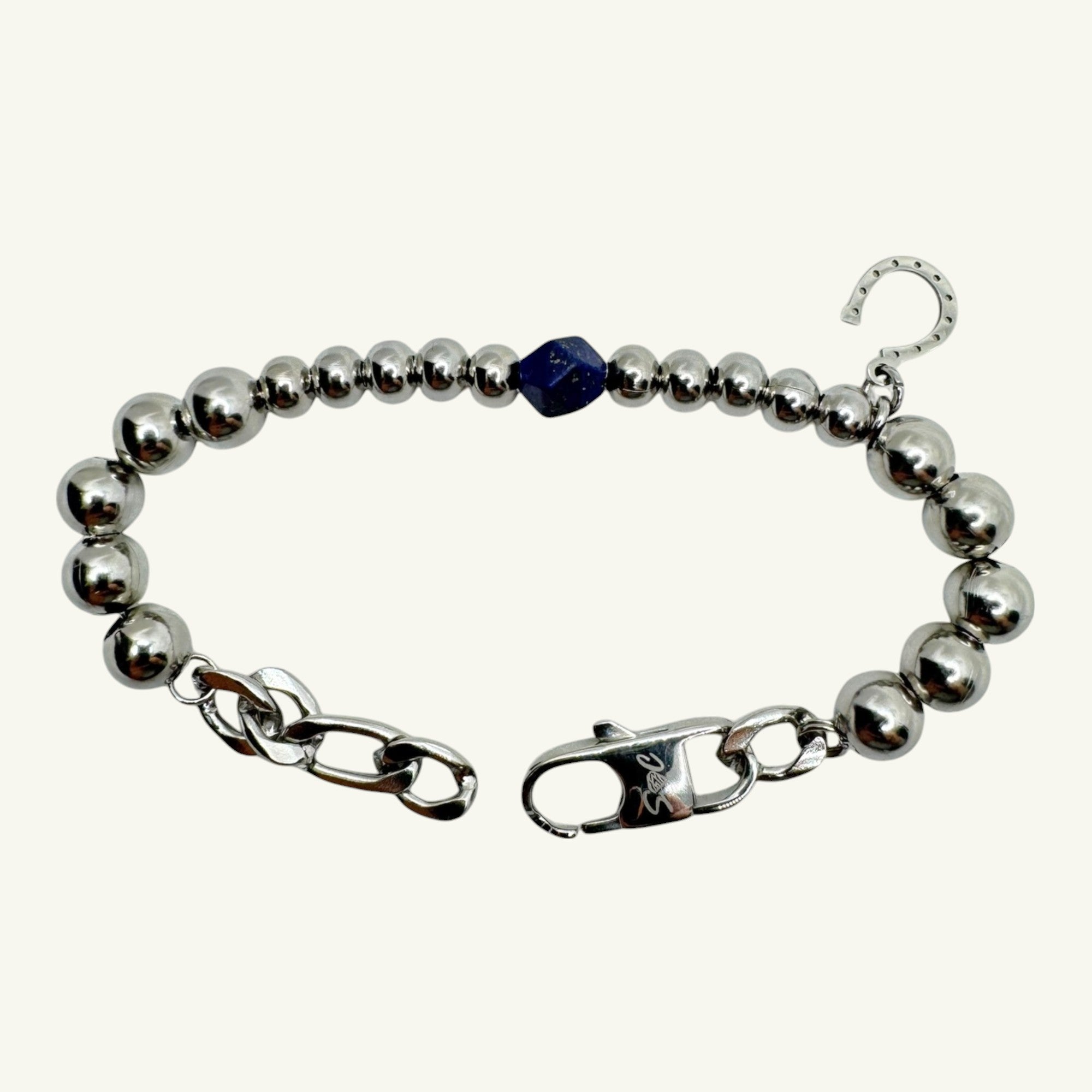 Bracciale lapislazzuli sfaccettato con charm ferro di cavallo Sharifa Crystals